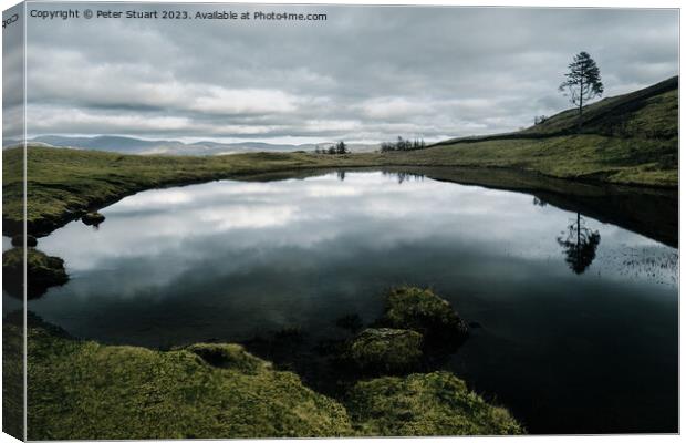 Hiking the Wainwright Outlying Fells in the Lake District From w Canvas Print by Peter Stuart