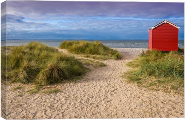 Findhorn Beach Huts Canvas Print by Peter Stuart