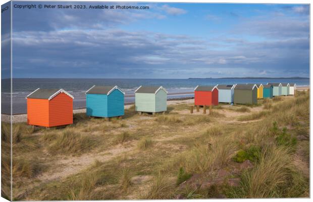 Findhorn Beach Huts Canvas Print by Peter Stuart