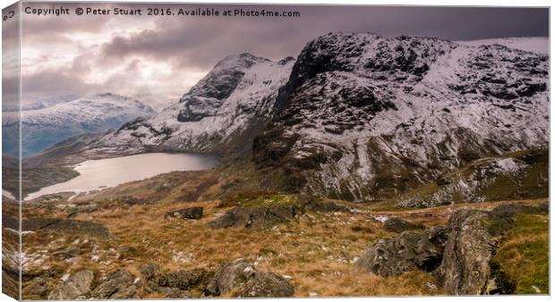 Thje Langdale Pikes Canvas Print by Peter Stuart