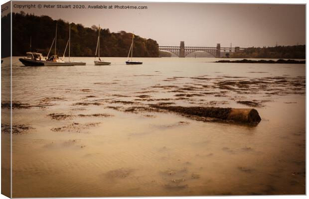Sailing boats on the Menai Straits near Anglesey Canvas Print by Peter Stuart