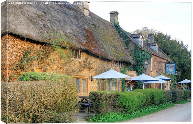 Falkland Arms Pub at Great Tew, Oxfordshire. Canvas Print by David Birchall