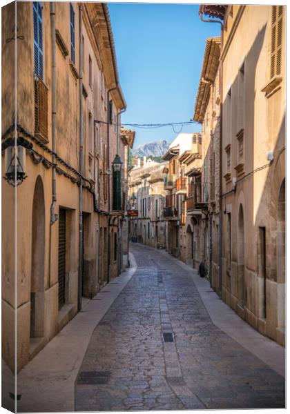Best street in Pollença? Canvas Print by Perry Johnson