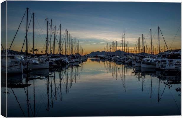 Reflections in Puerto Pollensa Canvas Print by Perry Johnson