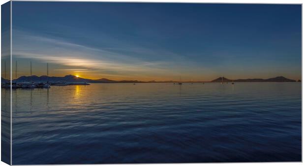 Sunrise across the bay of Pollensa Canvas Print by Perry Johnson