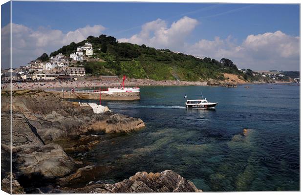  A boats heads out to sea at Looe Canvas Print by Rosie Spooner