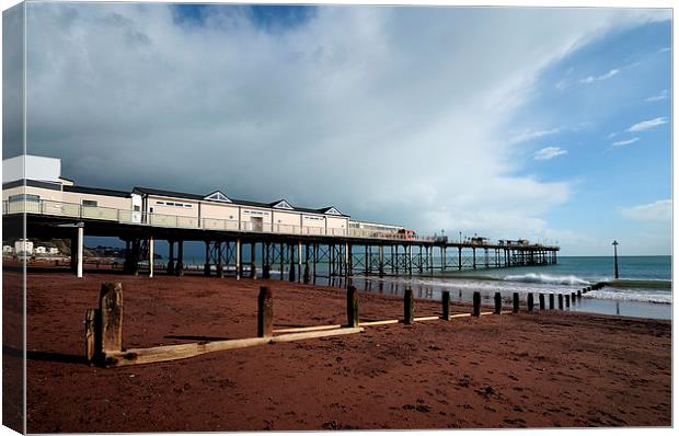  Clouds gather over Teignmouth Pier Canvas Print by Rosie Spooner