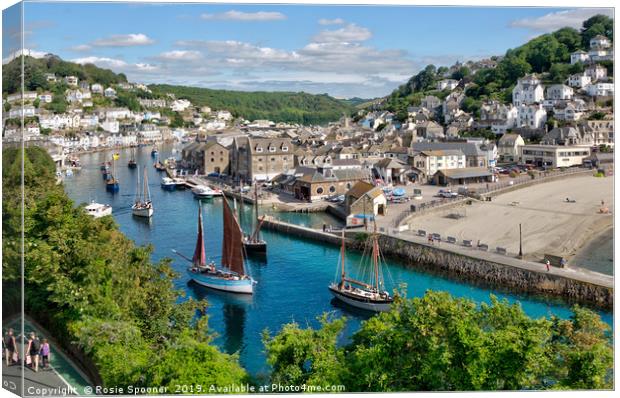 Luggers head down the River Looe for the Regatta Canvas Print by Rosie Spooner