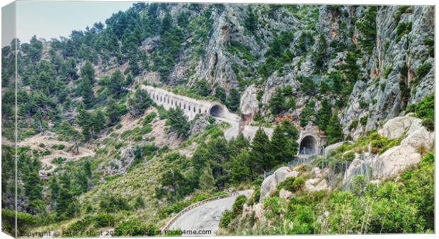The Rock Tunnels Of Mallorca  Canvas Print by Peter F Hunt