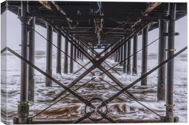 Rough Sea Under The Pier Canvas Print by Peter F Hunt