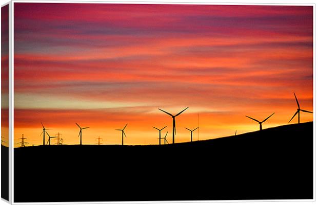 windmills at dusk Canvas Print by Peter Lennon