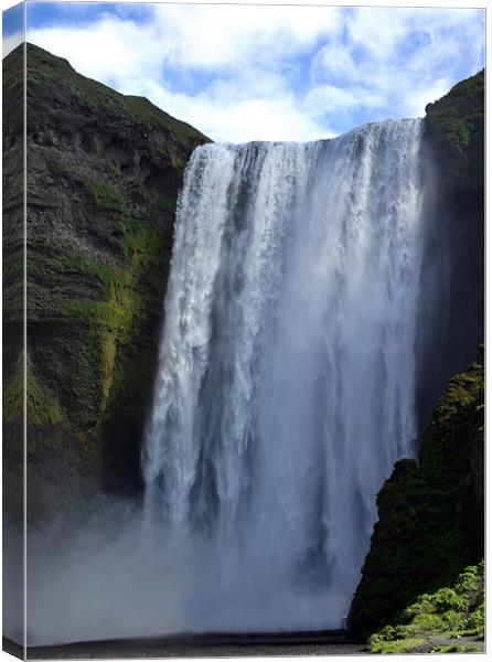 Skógafoss waterfall Iceland Canvas Print by Kay Gorzko