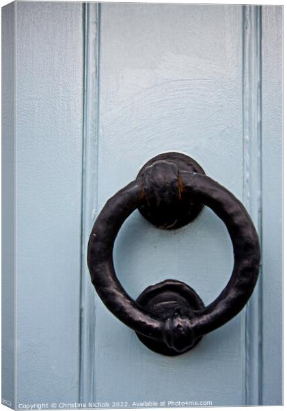 Black Door Knocker on Blue Wooden Door Canvas Print by Christine Kerioak