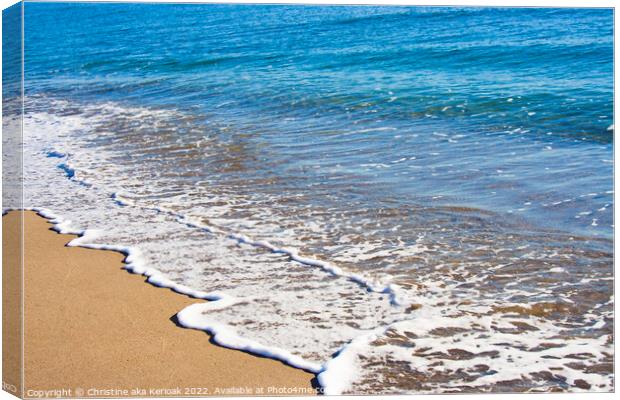 Gentle Waves on a Sandy Beach Canvas Print by Christine Kerioak