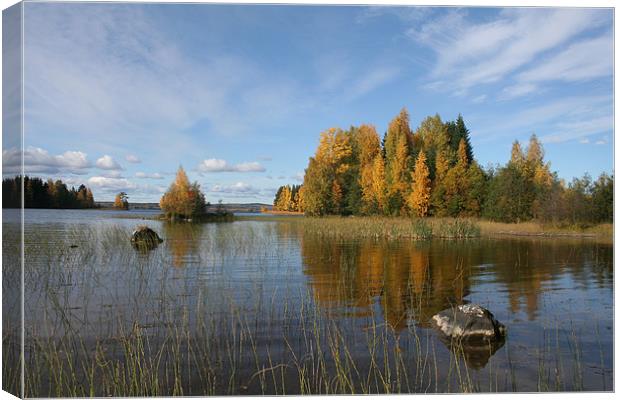 Autumn colors on the lake Canvas Print by Hemmo Vattulainen
