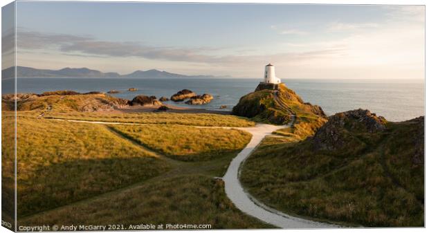 Majestic Sunset at Llanddwyn Lighthouse Canvas Print by Andy McGarry
