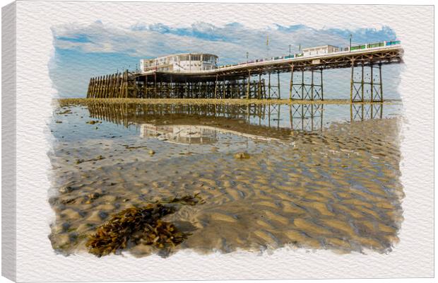 Worthing Pier & Beach at low tide. Canvas Print by Malcolm McHugh