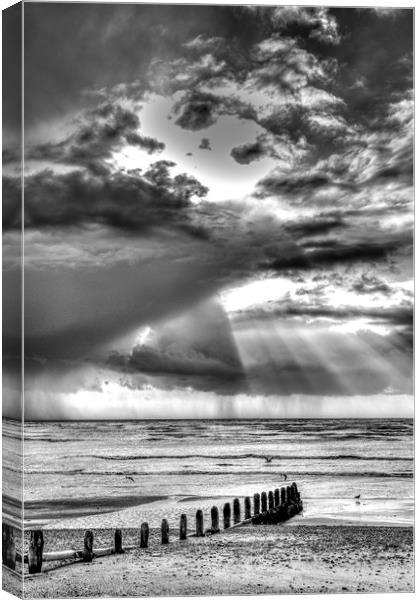 Sun-rays and Showers Canvas Print by Malcolm McHugh