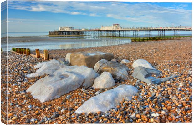 Rocks and pebbles Canvas Print by Malcolm McHugh