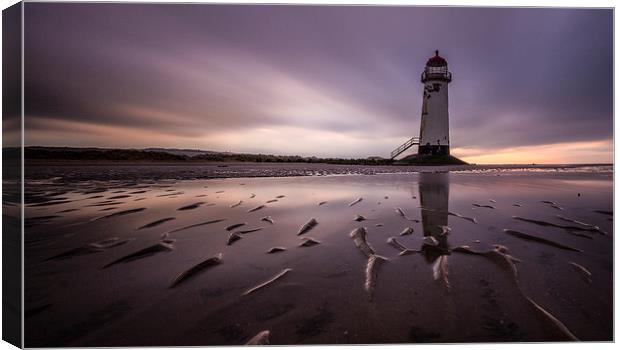 Lighthouse at dusk Canvas Print by Aaron Crowe