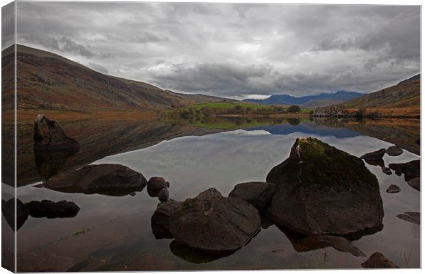  Reflections in a mountain Lake Canvas Print by Stephen Prosser