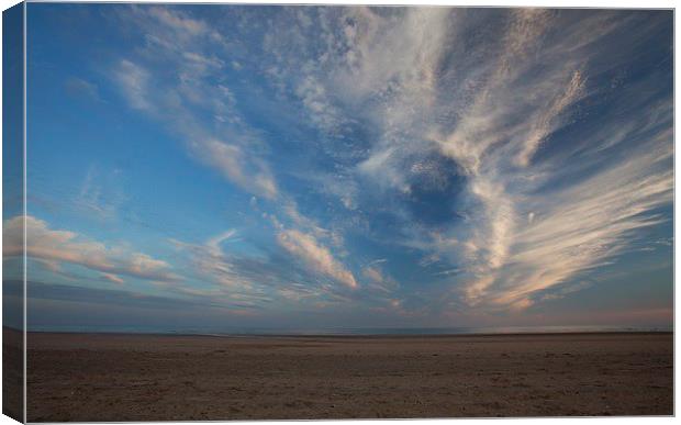  clouds rising over the beach Canvas Print by Stephen Prosser