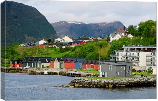 Boat Houses in Alesund Norway Canvas Print by Martyn Arnold