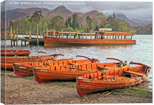 Derwentwater Canoes at Keswick Canvas Print by Martyn Arnold