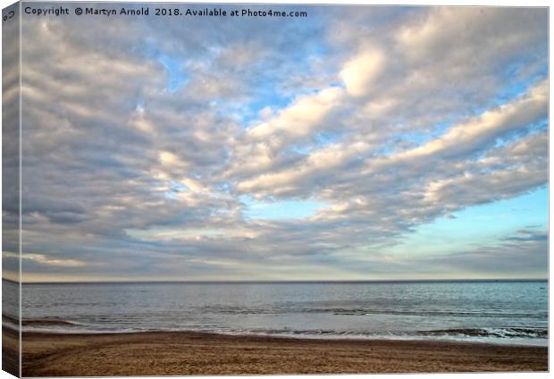 Sand Sea and Sky Canvas Print by Martyn Arnold