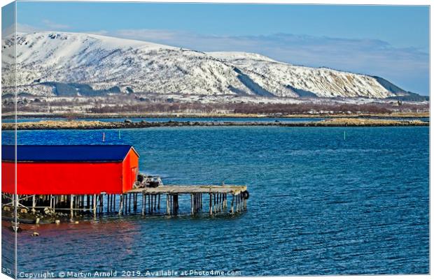 Risoyhamn Boathouse, Norway Canvas Print by Martyn Arnold