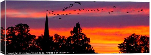 Heading Home - flock of geese at sunset Canvas Print by Martyn Arnold