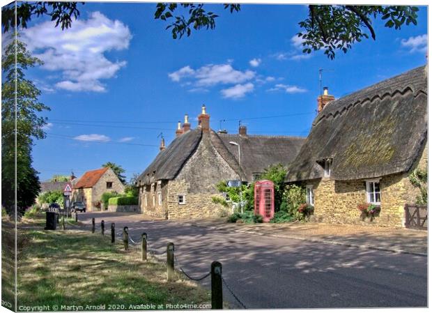 Grafton Underwood Thatch Cottage Village Northampt Canvas Print by Martyn Arnold