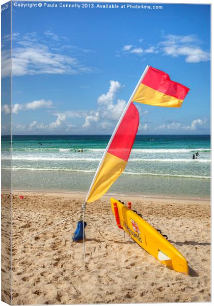 Lifeguards Flag and Surfboard Canvas Print by Paula Connelly