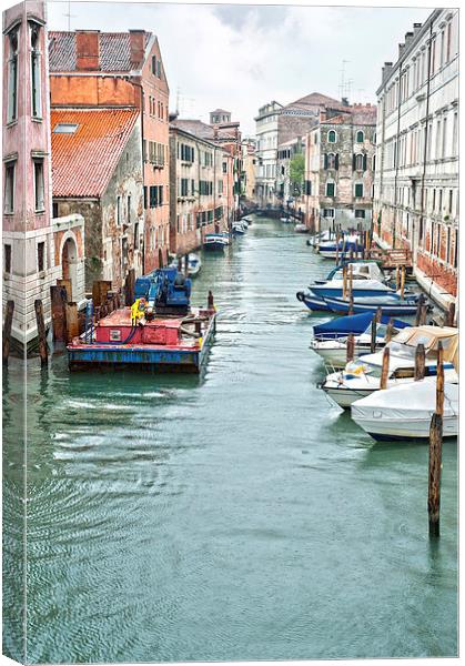 Canal Venice with motorboats Canvas Print by Jean Gill