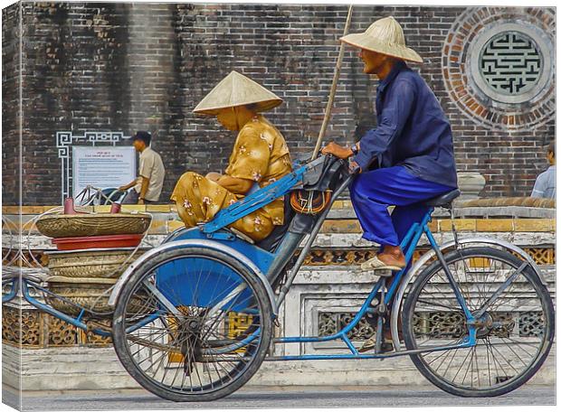 Vietnamese Bicycle Rickshaw Canvas Print by colin chalkley