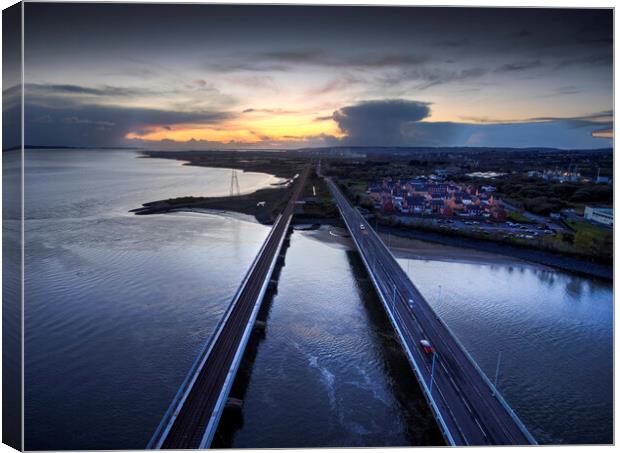 Loughor estuary road and rail bridges Canvas Print by Leighton Collins