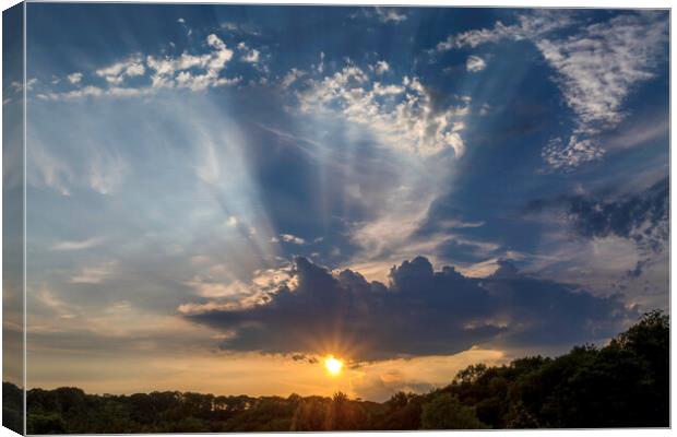 Sun rays and clouds Canvas Print by Leighton Collins