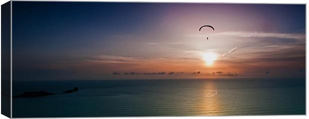 Paragliding over Worms Head Canvas Print by Leighton Collins