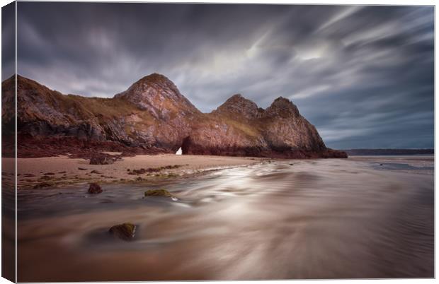 Low tide at Three Cliffs Bay Canvas Print by Leighton Collins