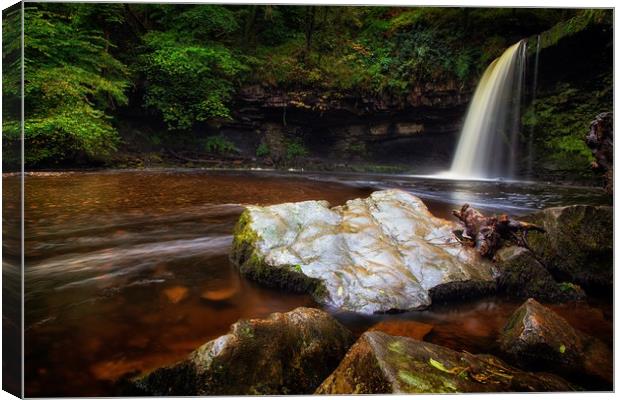 The rock at Sgwd Gwladus waterfall Canvas Print by Leighton Collins