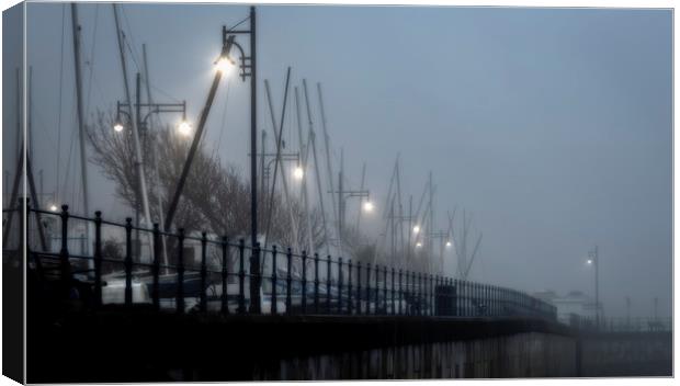 Street lights in the mist Canvas Print by Leighton Collins