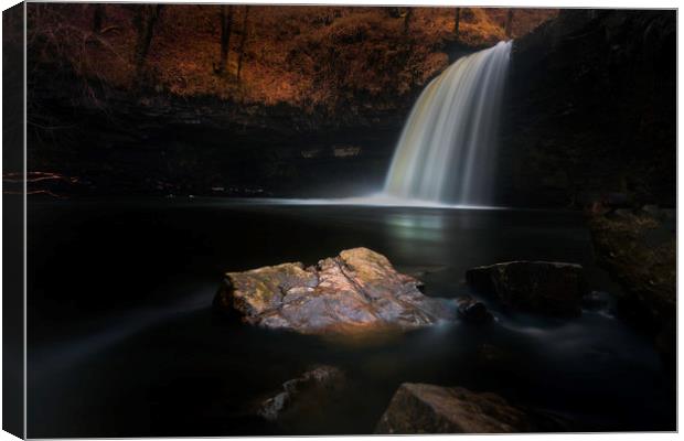 Moody Sgwd Gwladus waterfall Canvas Print by Leighton Collins