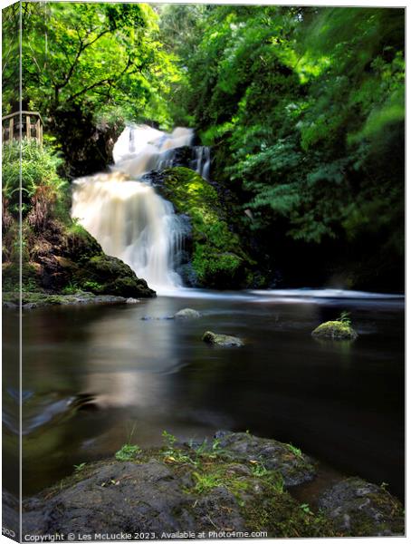 Waterfall on a windy day Canvas Print by Les McLuckie