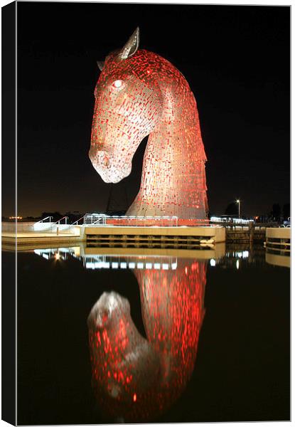 Glowing Red Kelpies A Majestic Sight Canvas Print by Les McLuckie