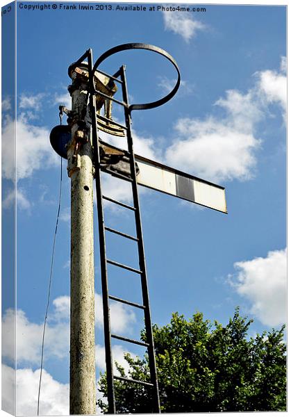 Old type semaphore signal set against a blue sky Canvas Print by Frank Irwin