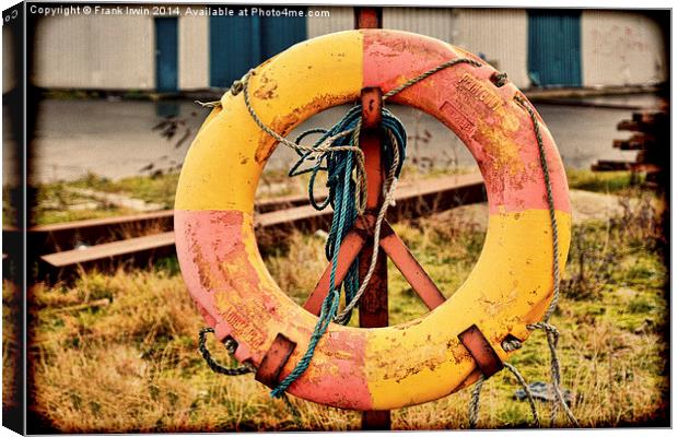 Old and redundant dockside life belt Canvas Print by Frank Irwin