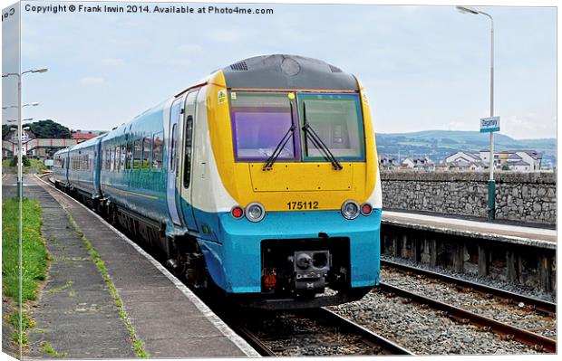 An Arriva train at Deganwy Station Canvas Print by Frank Irwin