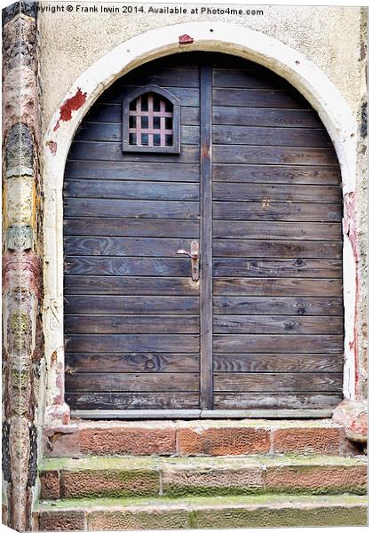  A Tatty German timber door Canvas Print by Frank Irwin