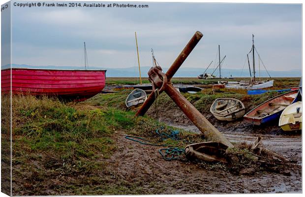  A Colourful red boat lies on Heswall Beach Canvas Print by Frank Irwin