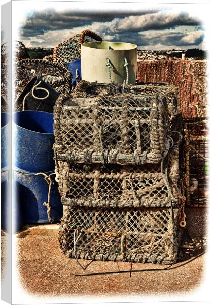 Lobster pots stacked up ready for reuse. (grunged) Canvas Print by Frank Irwin
